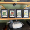 Four framed Fredonia seed packets