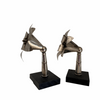 Pair of lily shaped Rebekah staff toppers mounted for display
