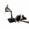 Pair of lily shaped Rebekah staff toppers mounted for display
