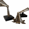 Pair of lily shaped Rebekah staff toppers mounted for display