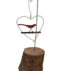 Primitive folk art bird on a wire sculpture (c 1990s)