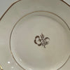 Painted china cup and saucer, floral design, unmarked