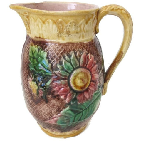 Antique Majolica water pitcher, stylized sunflower pattern, pink interior (c 1800s) - Selective Salvage